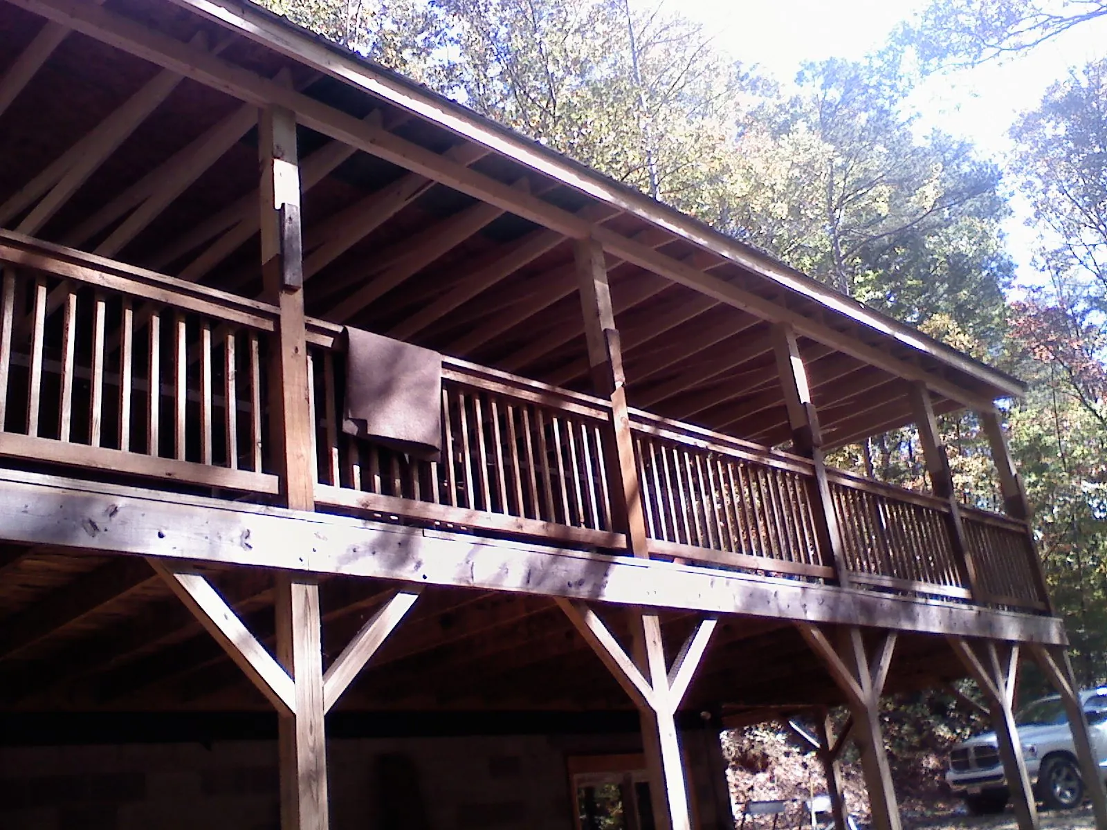 Timber framing under a new elevated porch and deck — Roof Leak Repair in Buncombe by Roofing Brothers